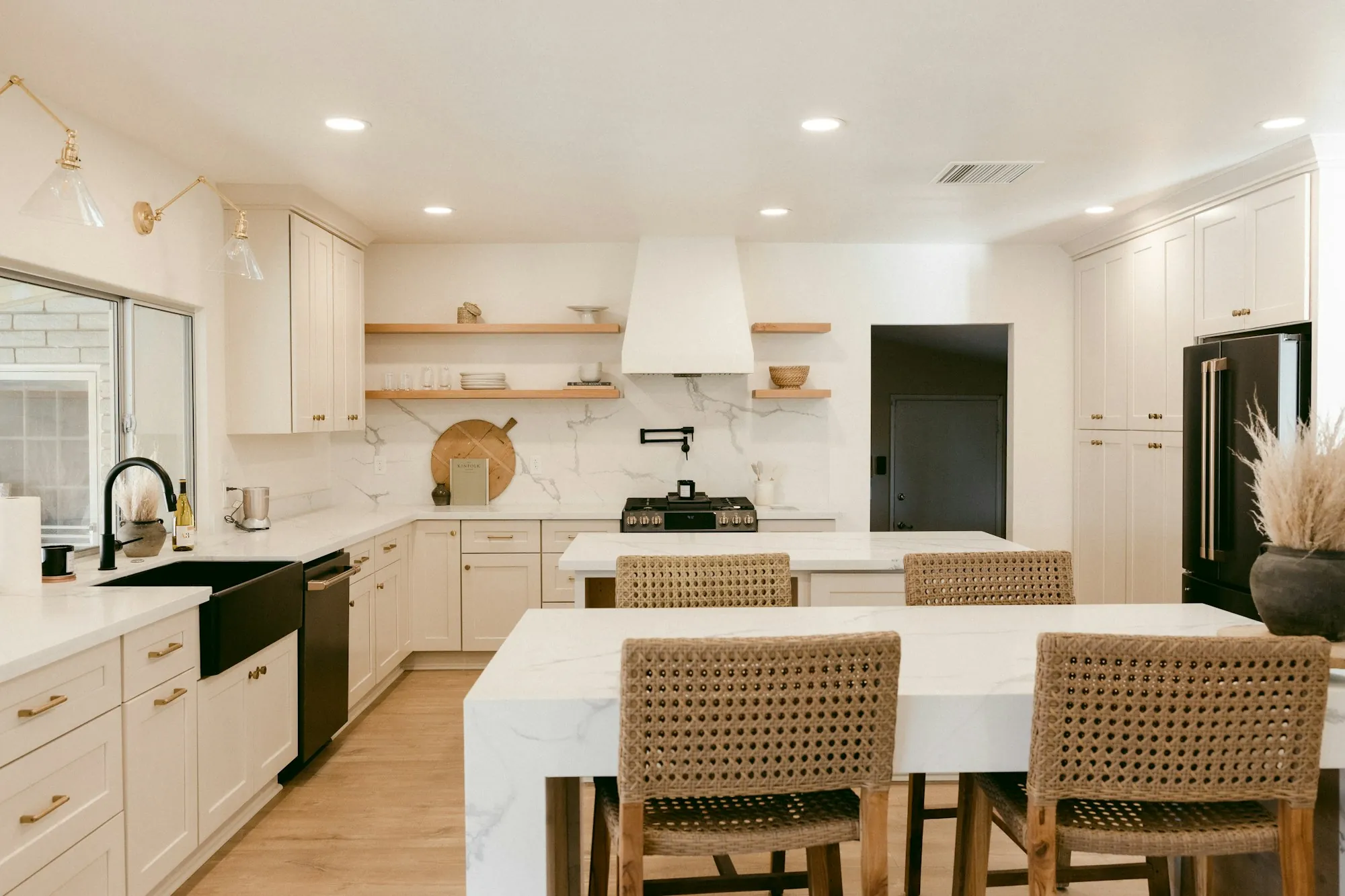 Bright finished kitchen with new pendant and recessed lighting