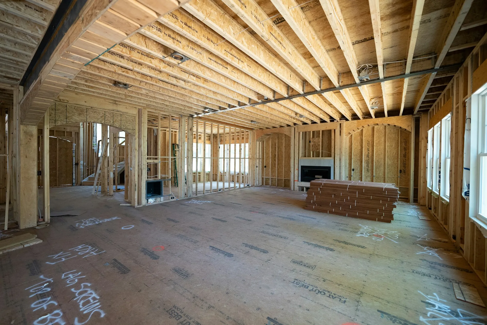 Open wall framing in a house ready for new electrical cable